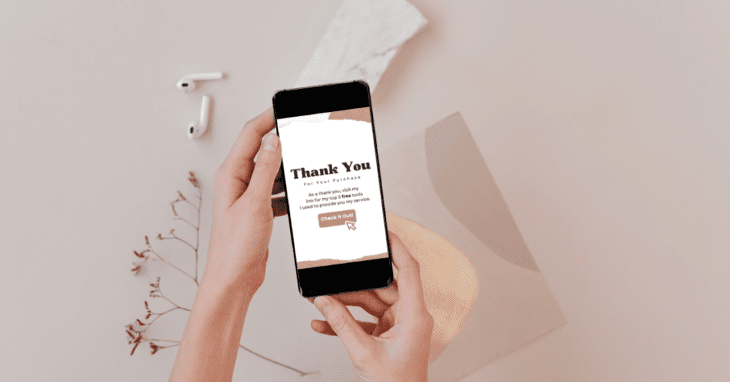 Hands holding phone showing a Thank You page