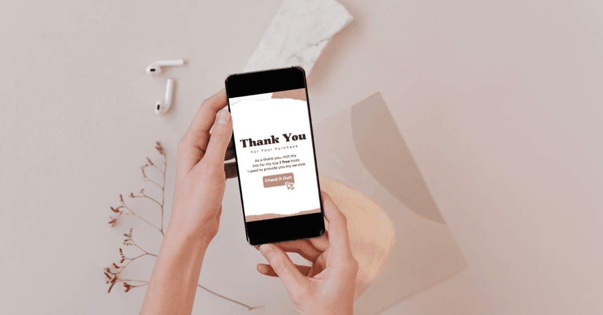 Hands holding phone showing a Thank You page