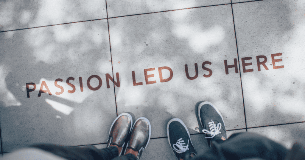 feet looking at words "passion led us here"
